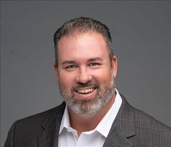 Man with beard with white shirt and sport coat