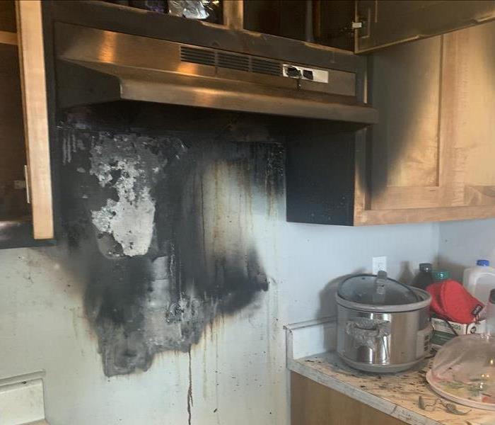 Stove fire in the Kitchen of this Rogers home