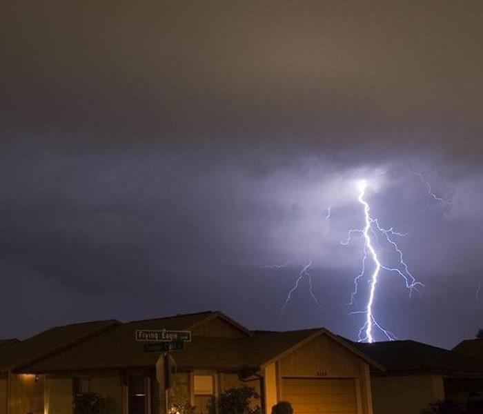 Lightning Storm Strikes Home at Night